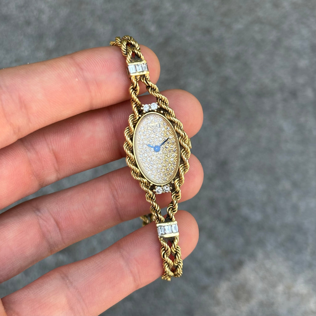Piaget 18k braceletwatch with diamonds & baguettes