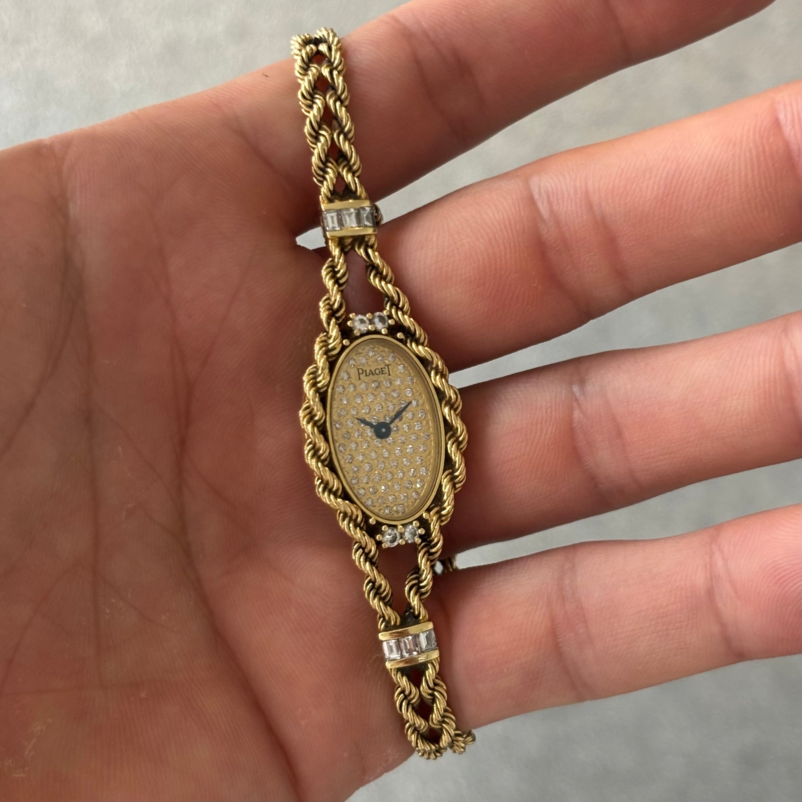 Piaget 18k braceletwatch with diamonds & baguettes