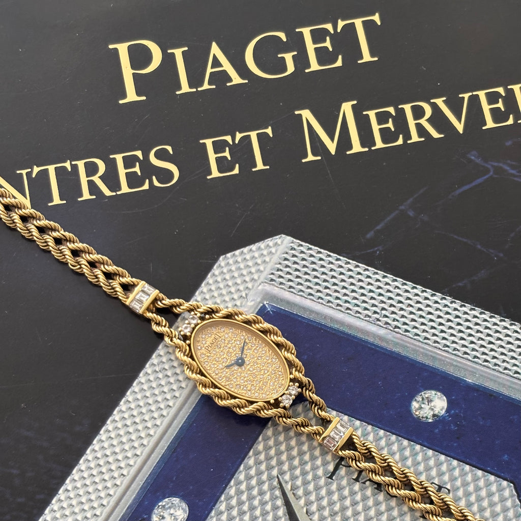 Piaget 18k braceletwatch with diamonds & baguettes