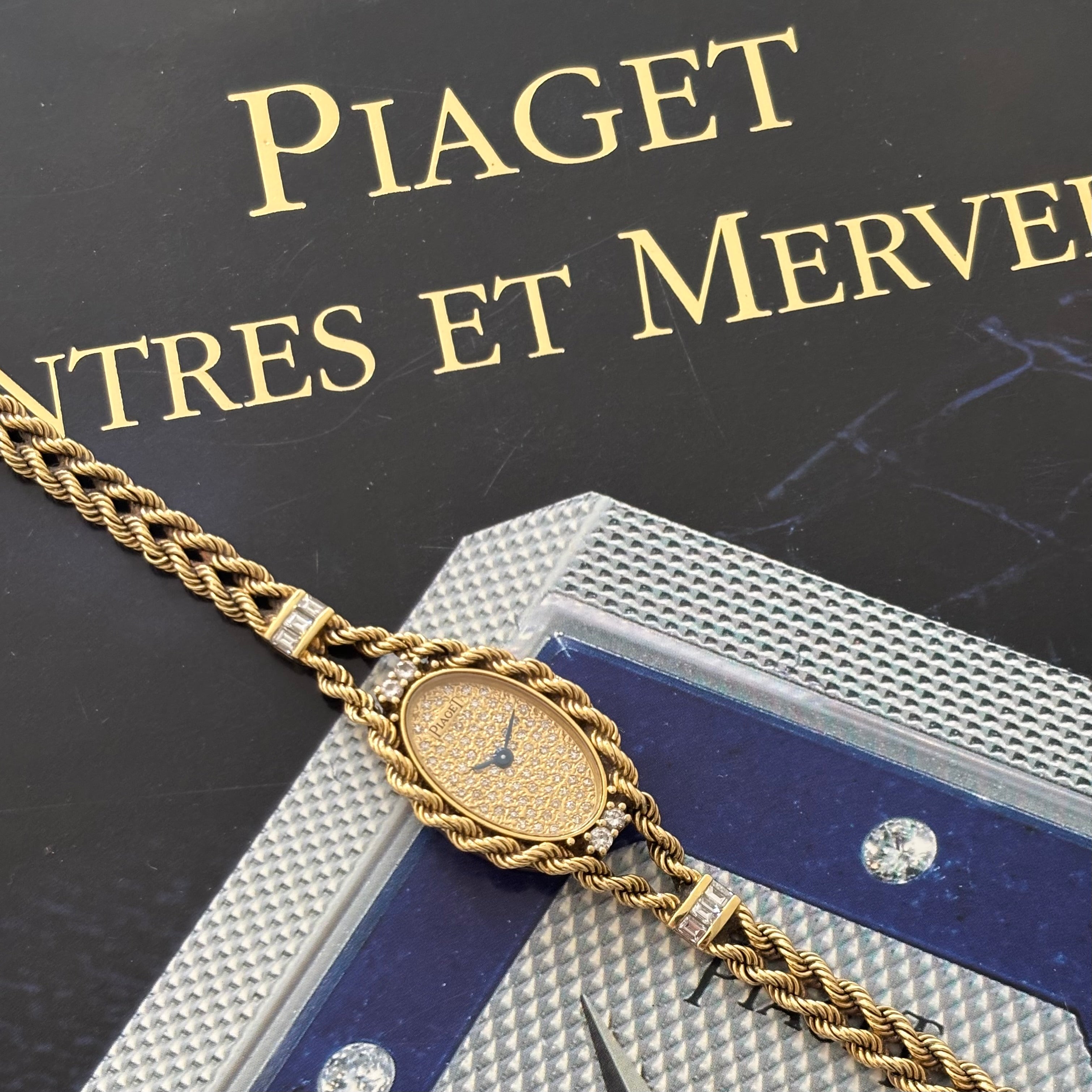 Piaget 18k braceletwatch with diamonds & baguettes