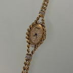 Piaget 18k braceletwatch with diamonds & baguettes