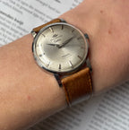 Movado Cartier signed Kingmatic with strap & buckle