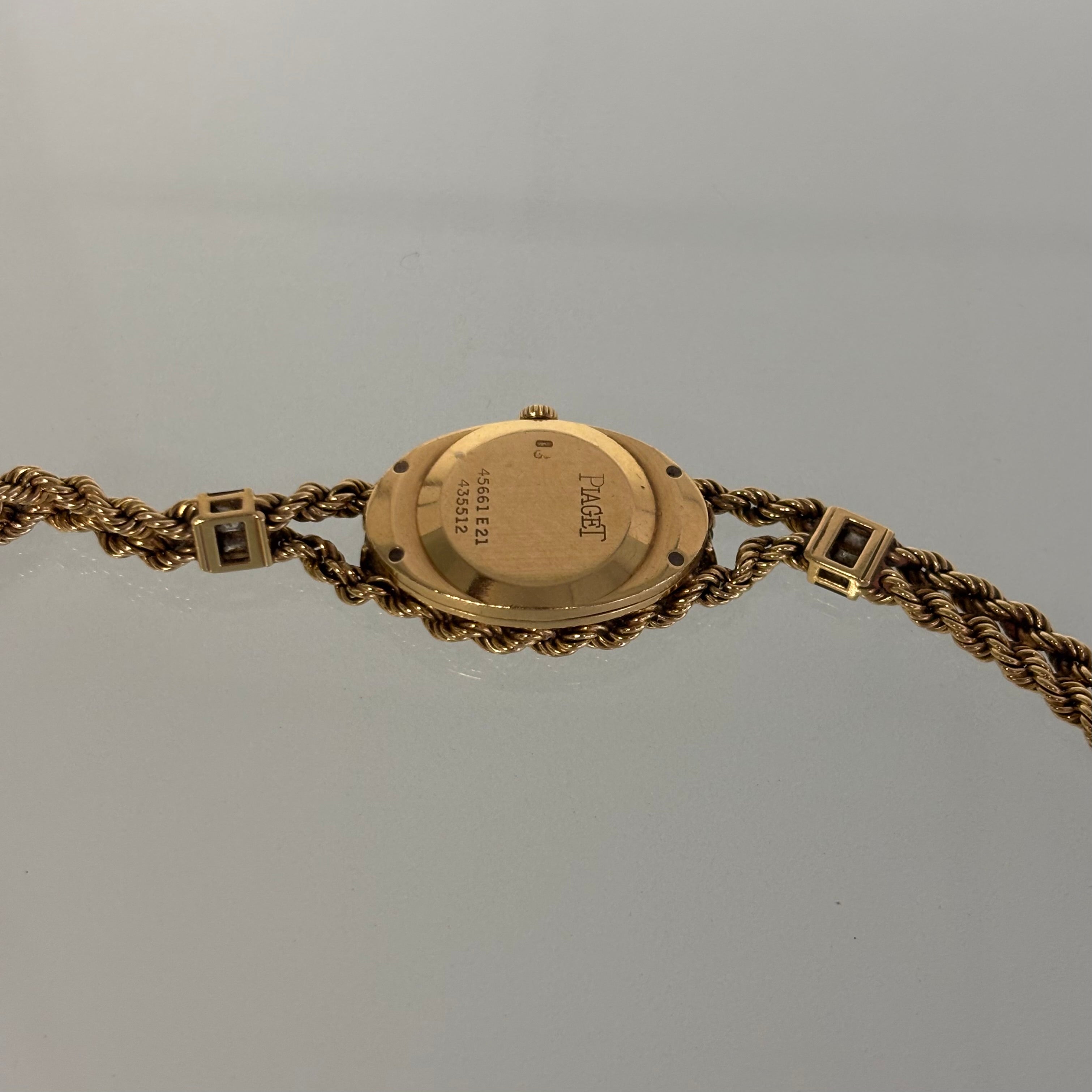 Piaget 18k braceletwatch with diamonds & baguettes