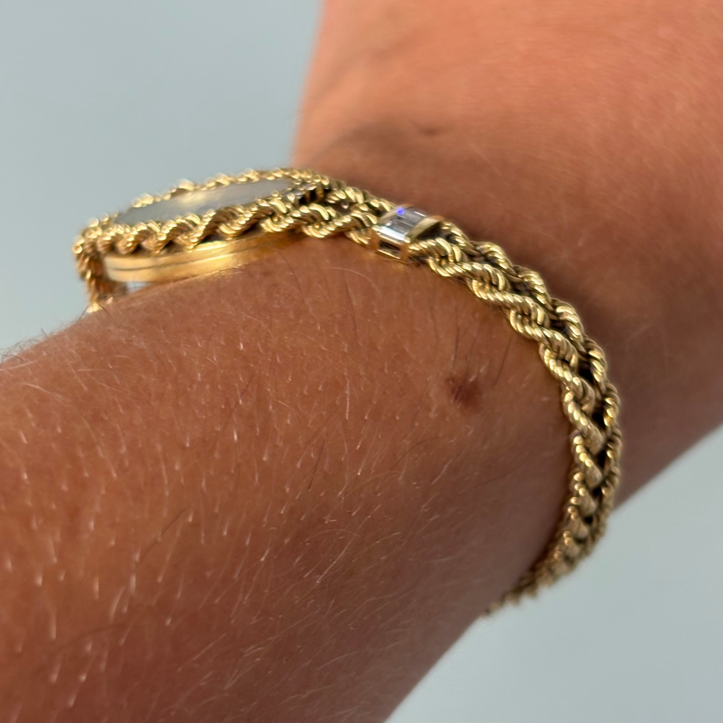 Piaget 18k braceletwatch with diamonds & baguettes