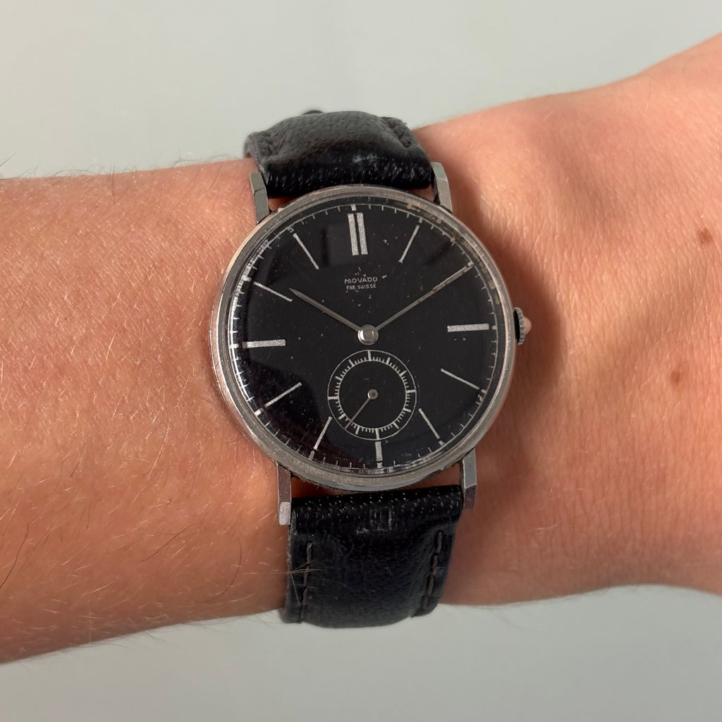 Movado “Fab. Suisse” Wristwatch – Black Dial, Stainless Steel