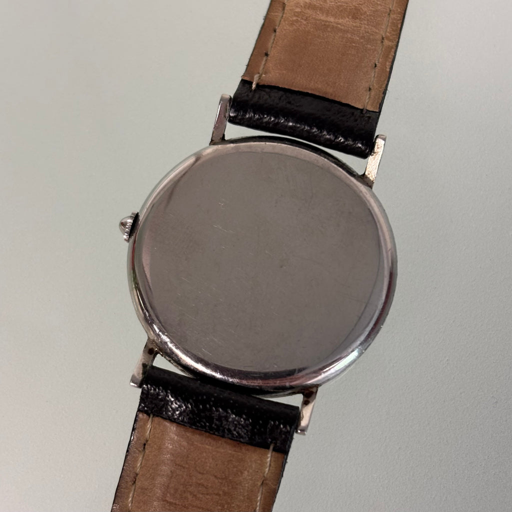 Movado “Fab. Suisse” Wristwatch – Black Dial, Stainless Steel