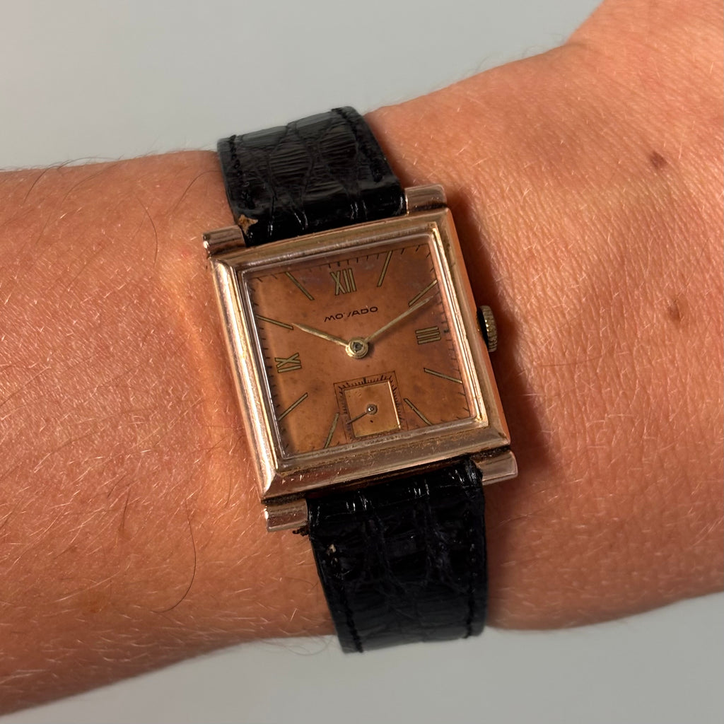 Movado 14k rose gold filled with stunning dial