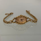 Piaget 18k braceletwatch with diamonds & baguettes