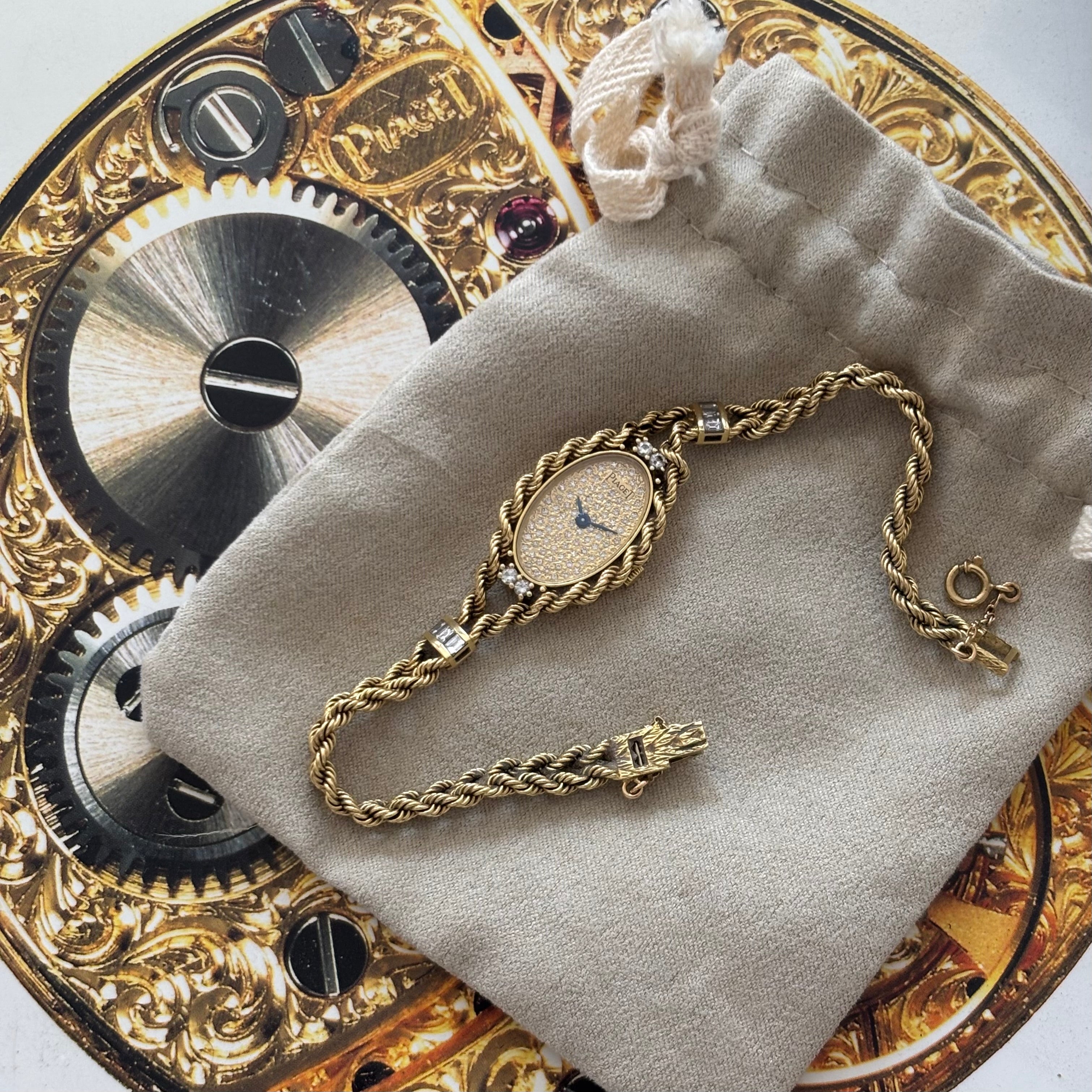 Piaget 18k braceletwatch with diamonds & baguettes