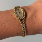 Piaget 18k braceletwatch with diamonds & baguettes