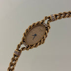 Piaget 18k braceletwatch with diamonds & baguettes