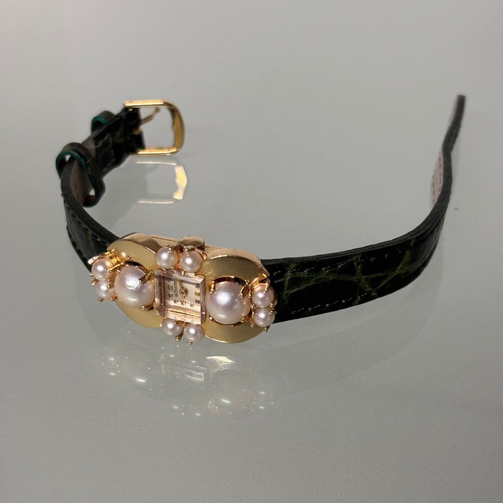 Jaeger Unique shaped yellow gold & pearl case