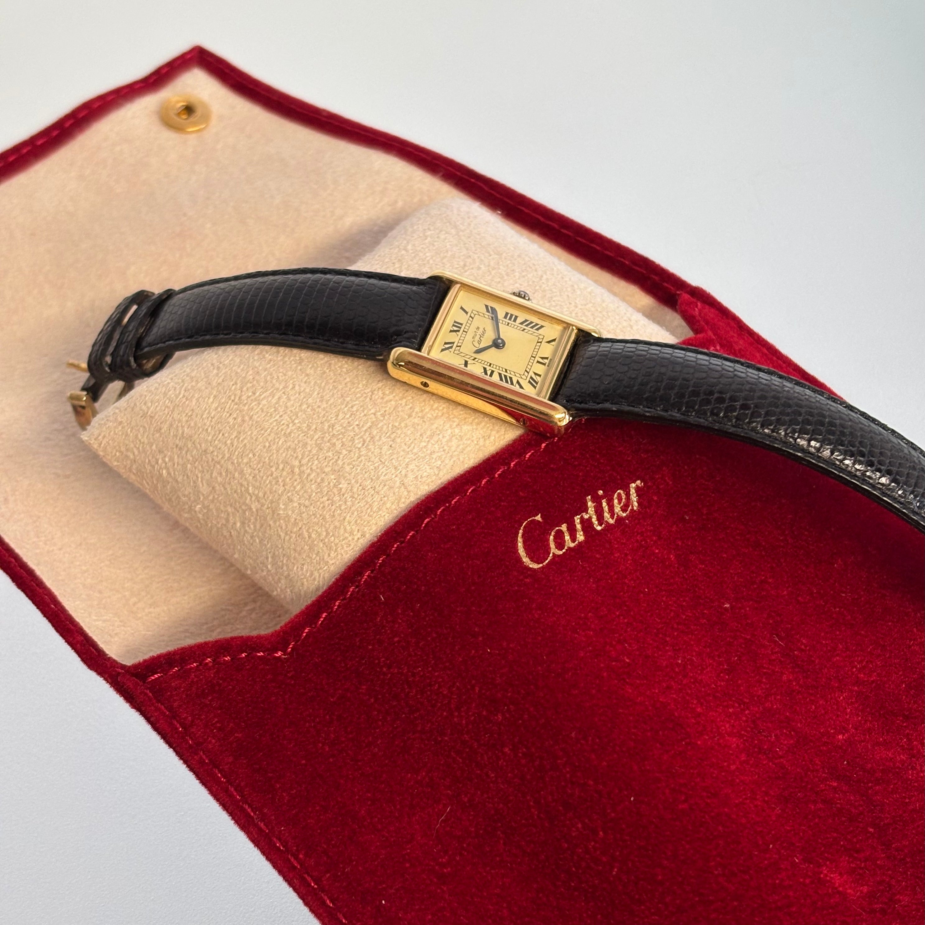 Cartier tank PM with buckle and pouch