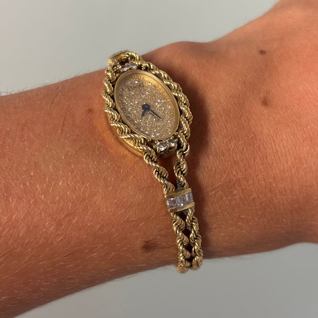Piaget 18k braceletwatch with diamonds & baguettes