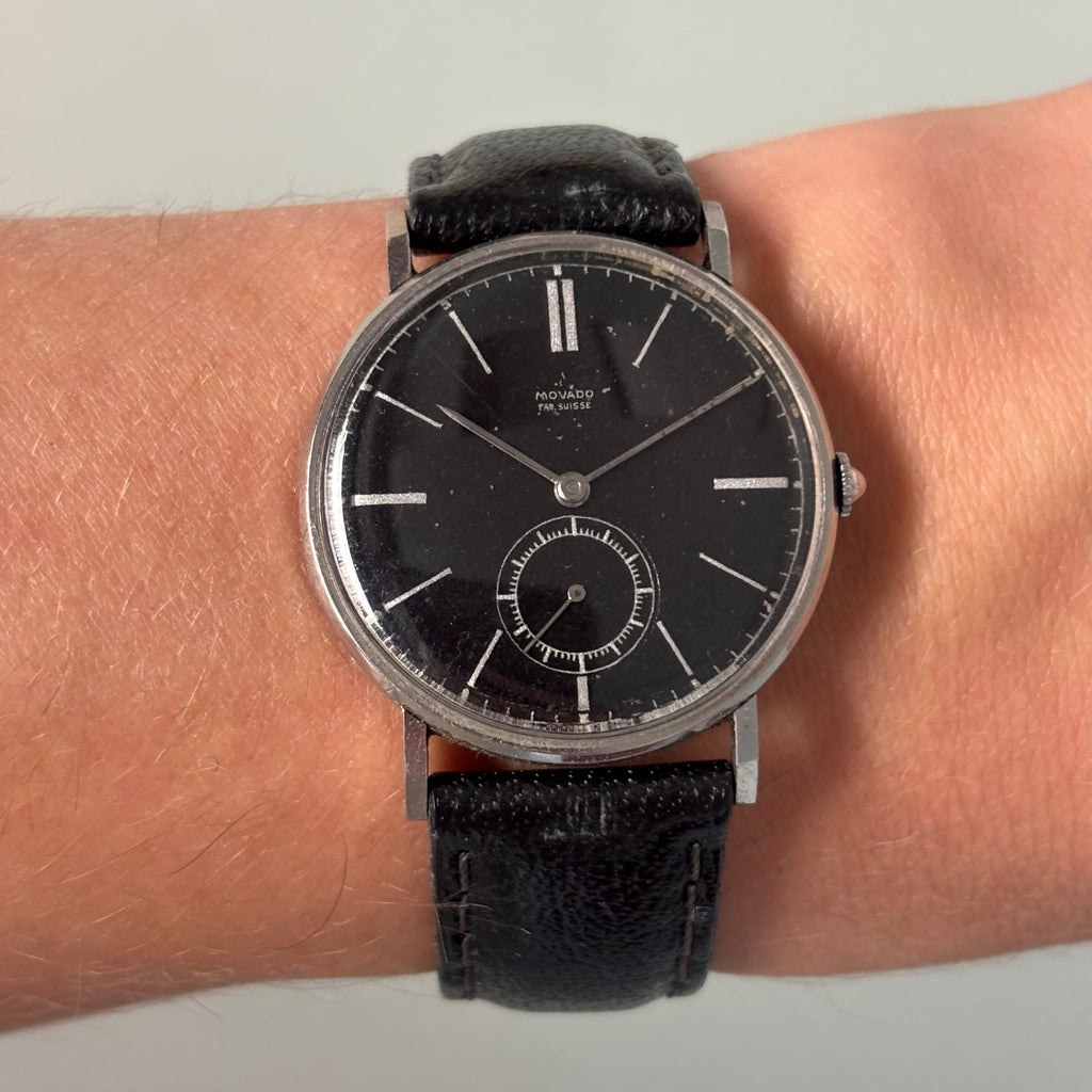 Movado “Fab. Suisse” Wristwatch – Black Dial, Stainless Steel