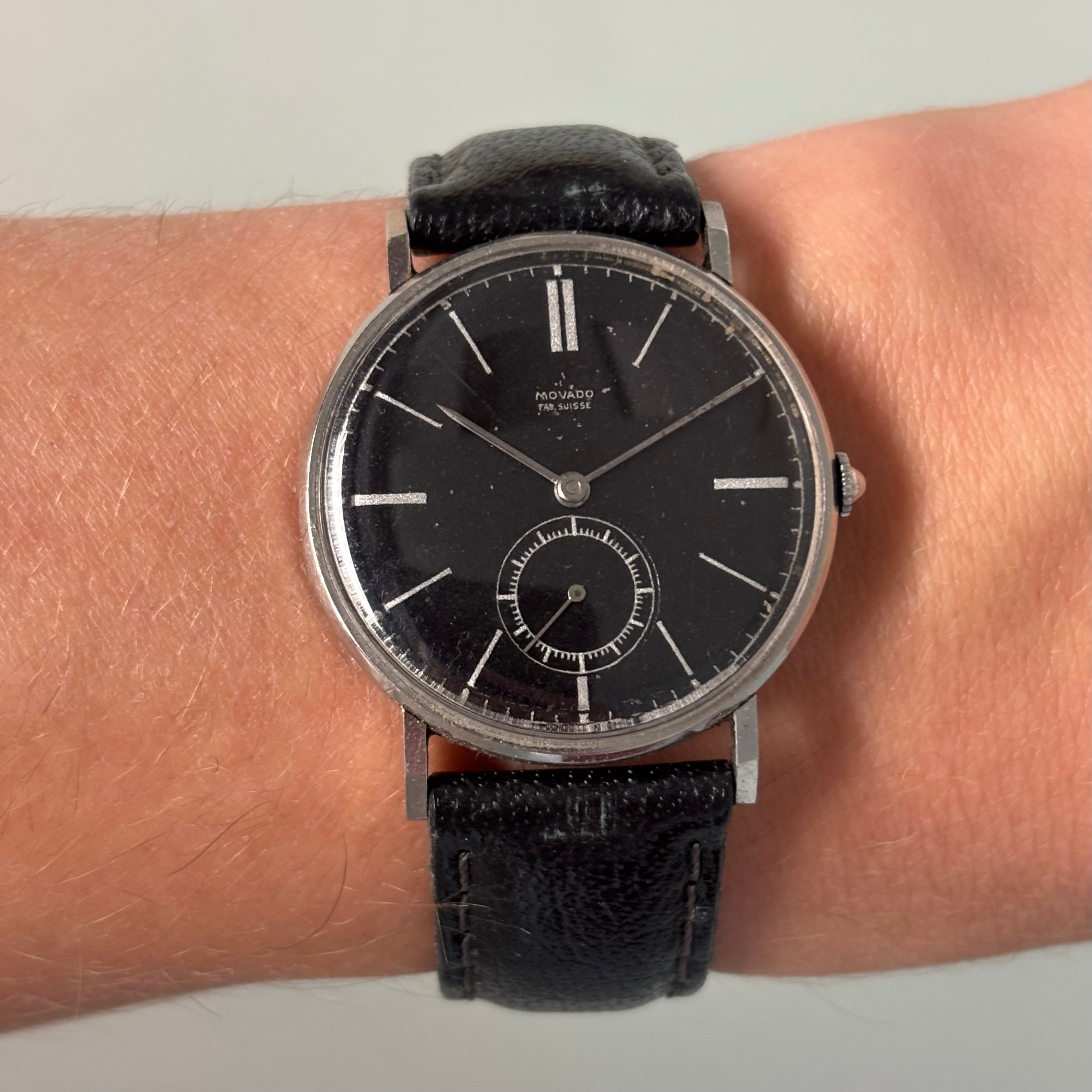 Movado “Fab. Suisse” Wristwatch – Black Dial, Stainless Steel
