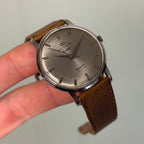 Movado Cartier signed Kingmatic with strap & buckle