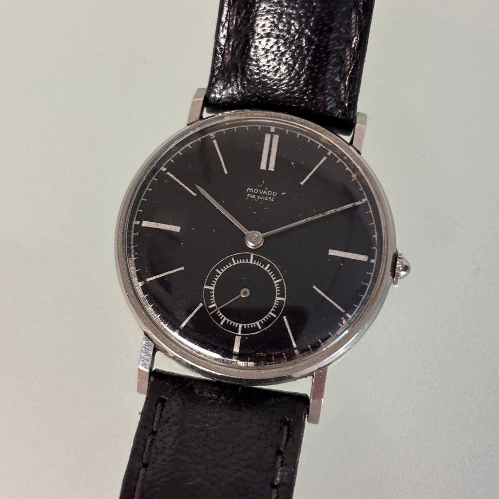 Movado “Fab. Suisse” Wristwatch – Black Dial, Stainless Steel