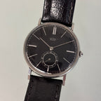 Movado “Fab. Suisse” Wristwatch – Black Dial, Stainless Steel