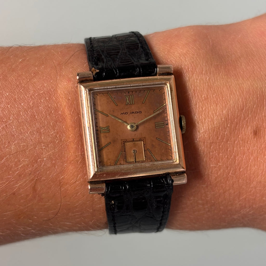 Movado 14k rose gold filled with stunning dial